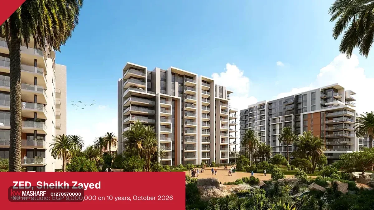 Residential towers with balconies rising behind palm trees and landscaped grounds